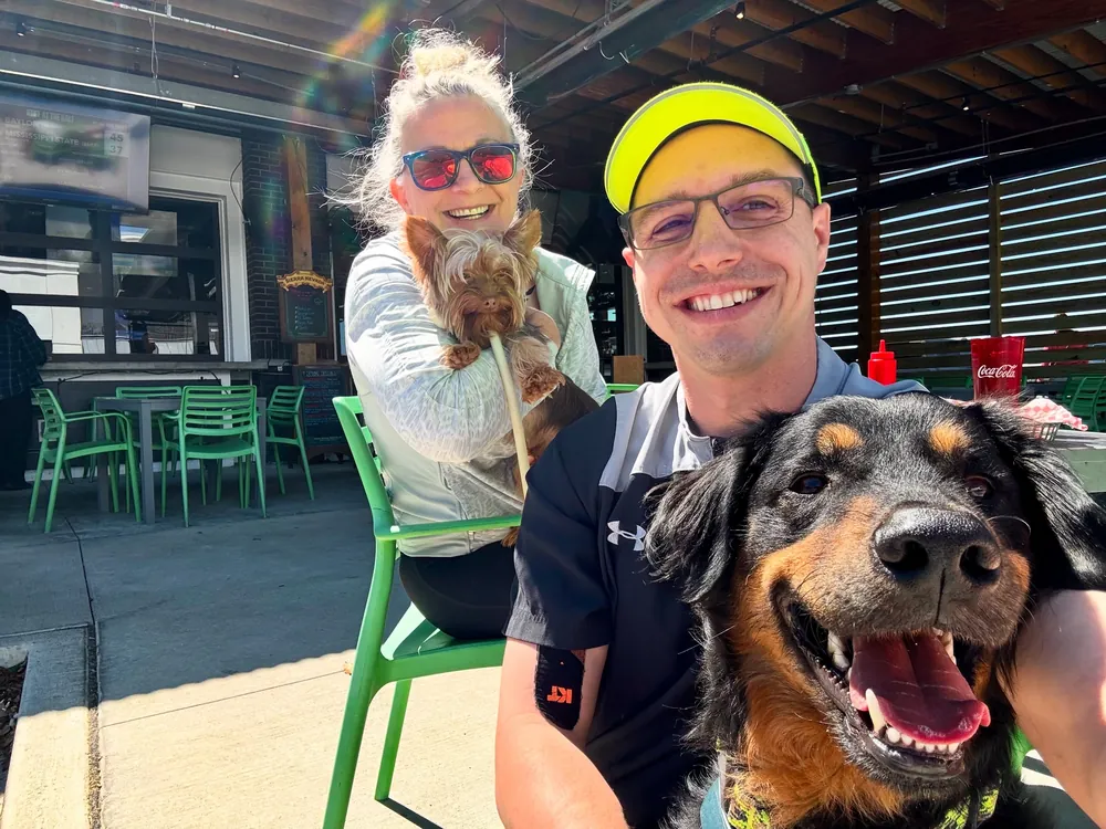 Skedaddle owner with the family dogs in the Lowcountry